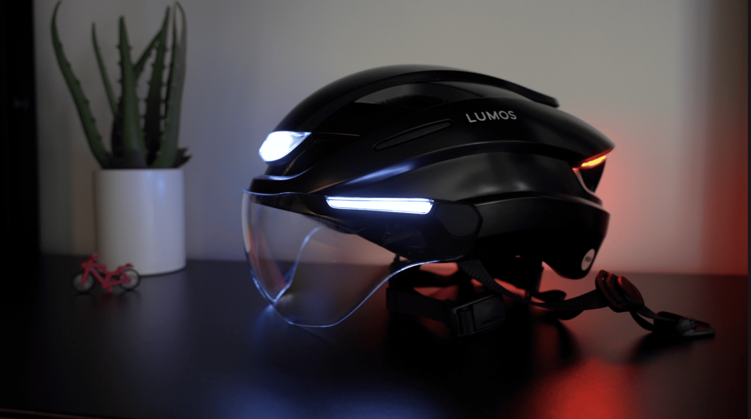 Casco De Bicicleta Lumos Ultra MIPS+ - Con Luces LED 360°, Mando A Distancia, Visera Extraíble, Color Gris Ceniza