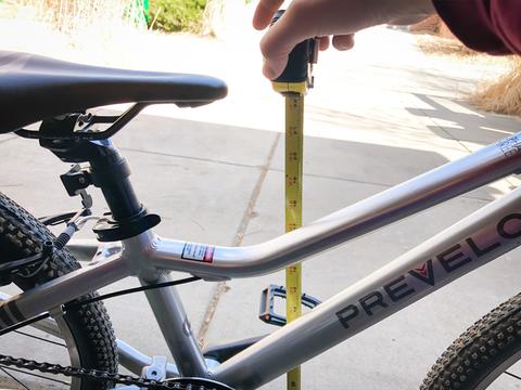 measuring kids bike standover