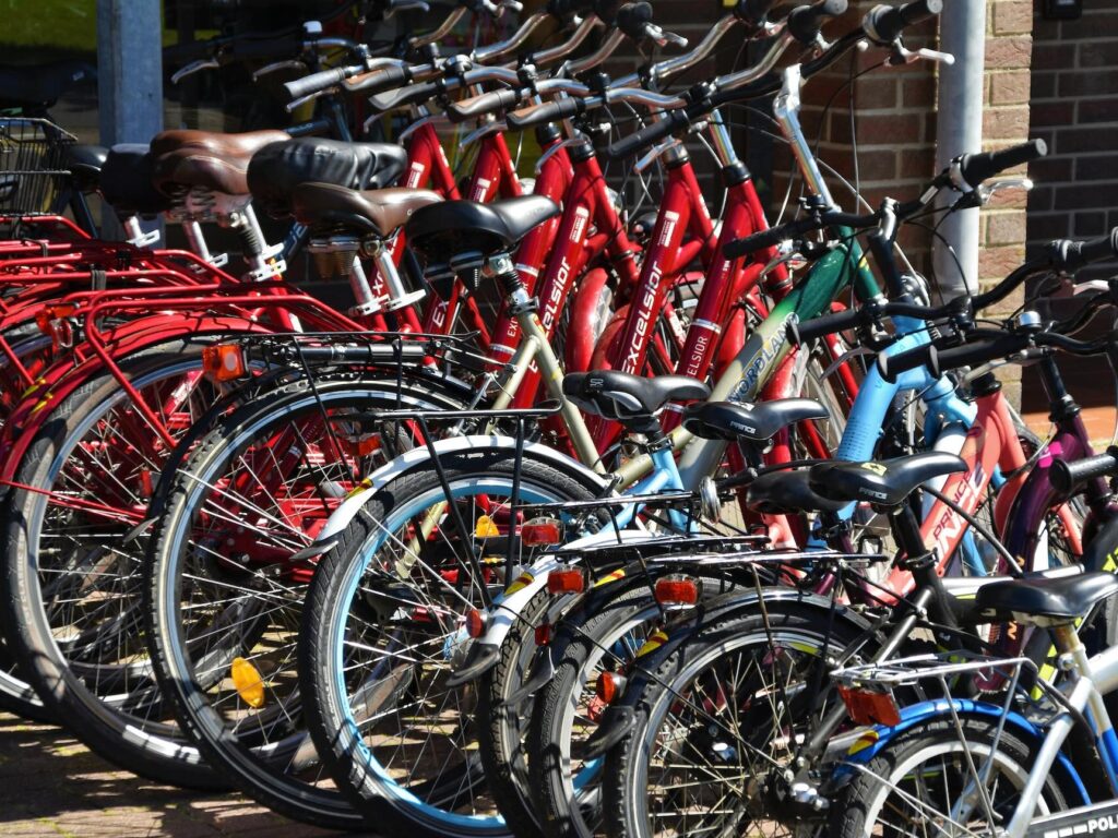 bicycles lined up outside of bike shop